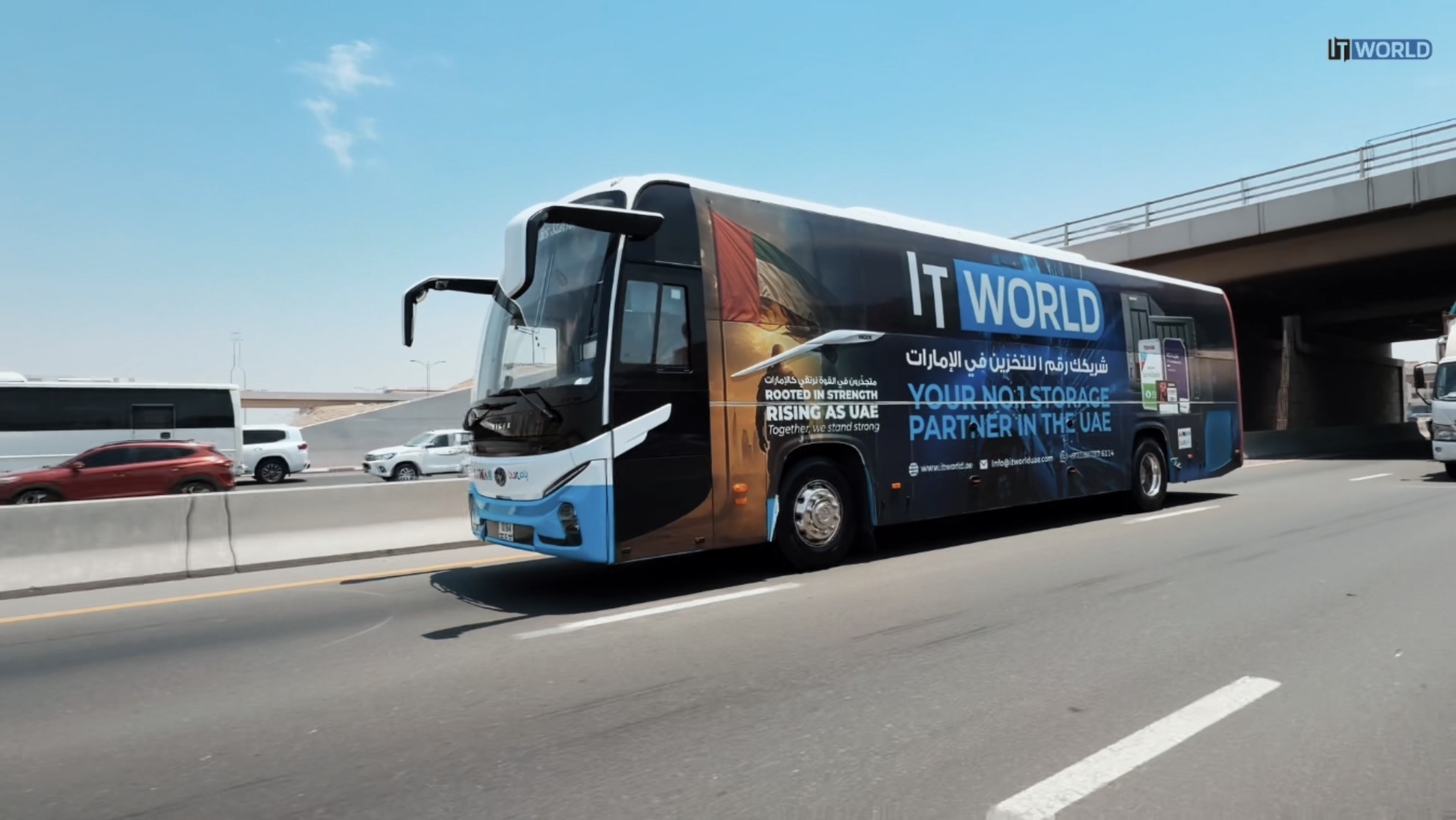 IT World Trading branded bus on a Dubai RTA route showcasing the storage partner campaign
